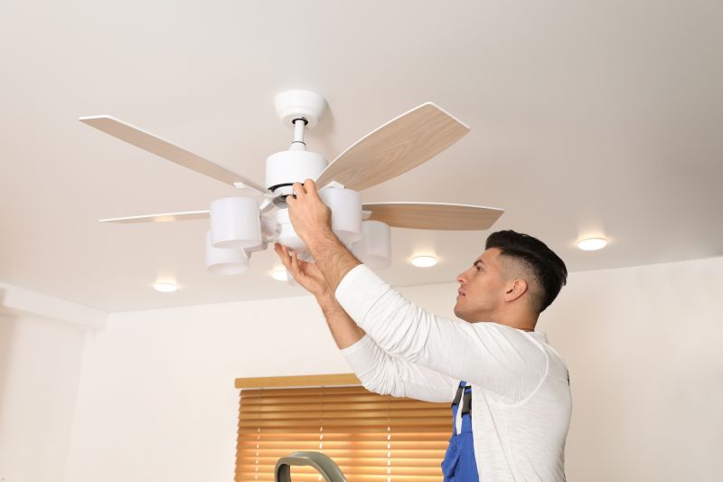 Handyman Fixing a Ceiling Fan